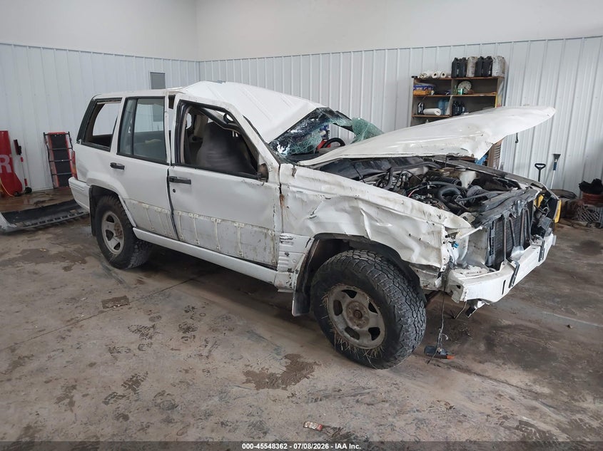 1993 Jeep Grand cherokee VIN 1J4GZ58S9PC513693 IAAI salvage auction — ROLLOVER, Regular (South Dakota), sold $300 on 2026-08-06 (photo 1)
