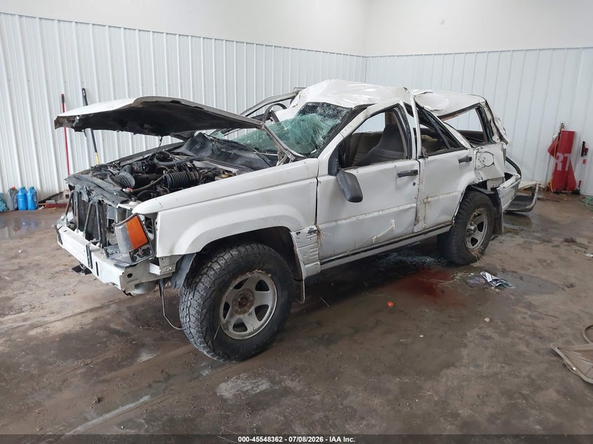 1993 Jeep Grand cherokee VIN 1J4GZ58S9PC513693 IAAI salvage auction — ROLLOVER, Regular (South Dakota), sold $300 on 2026-08-06 (photo 2)