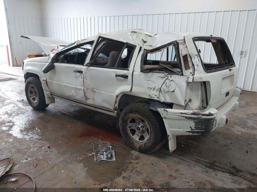 1993 Jeep Grand cherokee VIN 1J4GZ58S9PC513693 IAAI salvage auction — ROLLOVER, Regular (South Dakota), sold $300 on 2026-08-06 (photo 3)