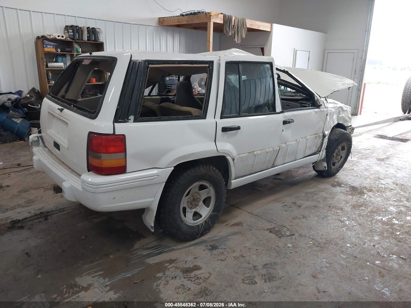 1993 Jeep Grand cherokee VIN 1J4GZ58S9PC513693 IAAI salvage auction — ROLLOVER, Regular (South Dakota), sold $300 on 2026-08-06 (photo 4)