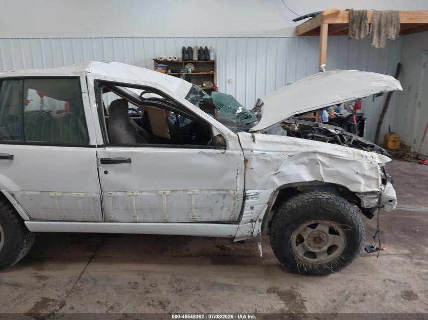 1993 Jeep Grand cherokee VIN 1J4GZ58S9PC513693 IAAI salvage auction — ROLLOVER, Regular (South Dakota), sold $300 on 2026-08-06 (photo 6)