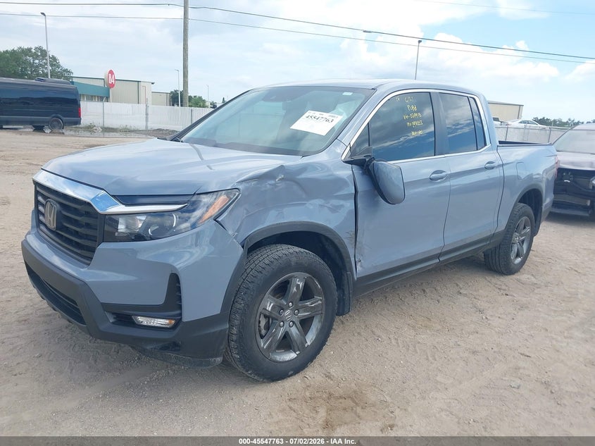 2023 Honda Ridgeline VIN 5FPYK3F55PB039915 IAAI salvage auction — FRONT END, Rebuildable (Florida), sold $9,100 on 2026-07-28 (photo 2)