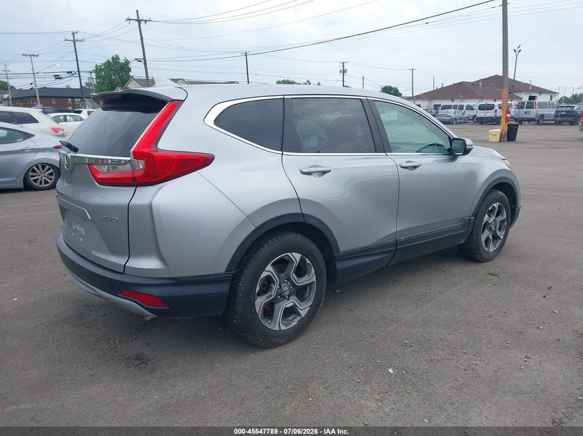 2018 Honda Cr-v VIN 7FARW2H55JE097897 IAAI salvage auction — NORMAL WEAR, Clear (New York), sold $3,250 on 2026-07-15 (photo 4)