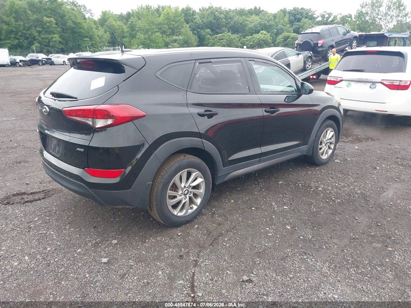 2016 Hyundai Tucson VIN KM8J3CA42GU248070 IAAI salvage auction — LEFT SIDE, Salvage (Idaho), sold $3,100 on 2026-07-22 (photo 4)