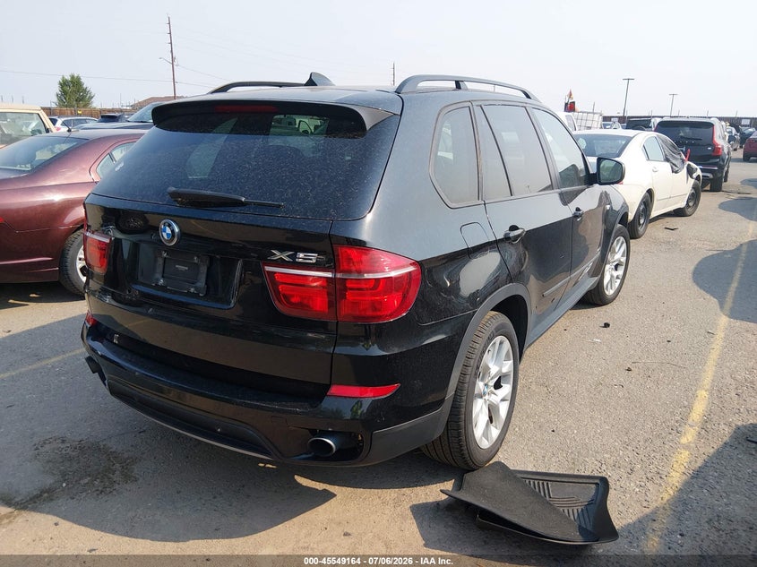 2012 BMW X5 VIN 5UXZV4C50CL991080 IAAI salvage auction — NORMAL WEAR, Clear (Florida), sold $1,325 on 2026-07-28 (photo 4)