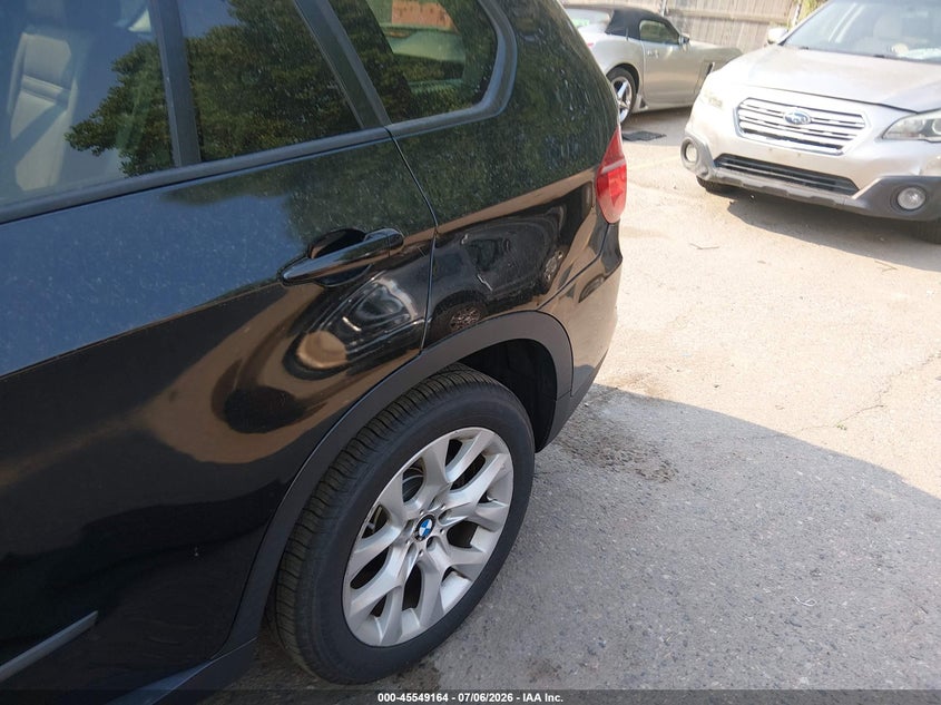 2012 BMW X5 VIN 5UXZV4C50CL991080 IAAI salvage auction — NORMAL WEAR, Clear (Florida), sold $1,325 on 2026-07-28 (photo 6)