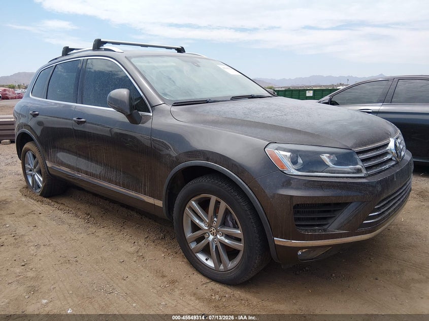 2015 Volkswagen Touareg VIN WVGEP9BP5FD007412 IAAI salvage auction — NORMAL WEAR, Salvage Title, sold $2,550 on 2026-08-04 (photo 1)