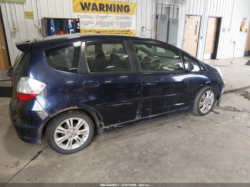 2009 Honda Fit VIN JHMGE87469S032555 IAAI salvage auction — NORMAL WEAR, Clear (North Dakota), sold $800 on 2026-07-30 (photo 4)