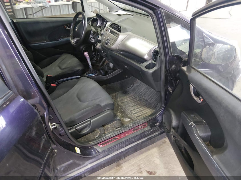 2009 Honda Fit VIN JHMGE87469S032555 IAAI salvage auction — NORMAL WEAR, Clear (North Dakota), sold $800 on 2026-07-30 (photo 5)