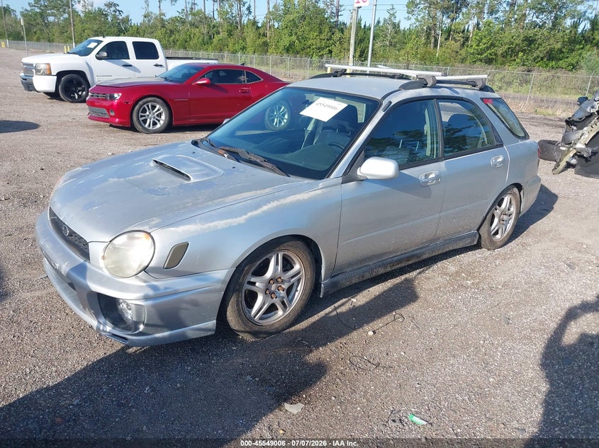 2002 Subaru Impreza VIN JF1GG29602G830328 IAAI salvage auction — STORM DAMAGE, Rebuildable (Florida), sold $875 on 2026-07-28 (photo 2)