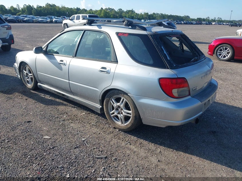 2002 Subaru Impreza VIN JF1GG29602G830328 IAAI salvage auction — STORM DAMAGE, Rebuildable (Florida), sold $875 on 2026-07-28 (photo 3)