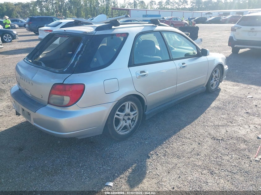 2002 Subaru Impreza VIN JF1GG29602G830328 IAAI salvage auction — STORM DAMAGE, Rebuildable (Florida), sold $875 on 2026-07-28 (photo 4)