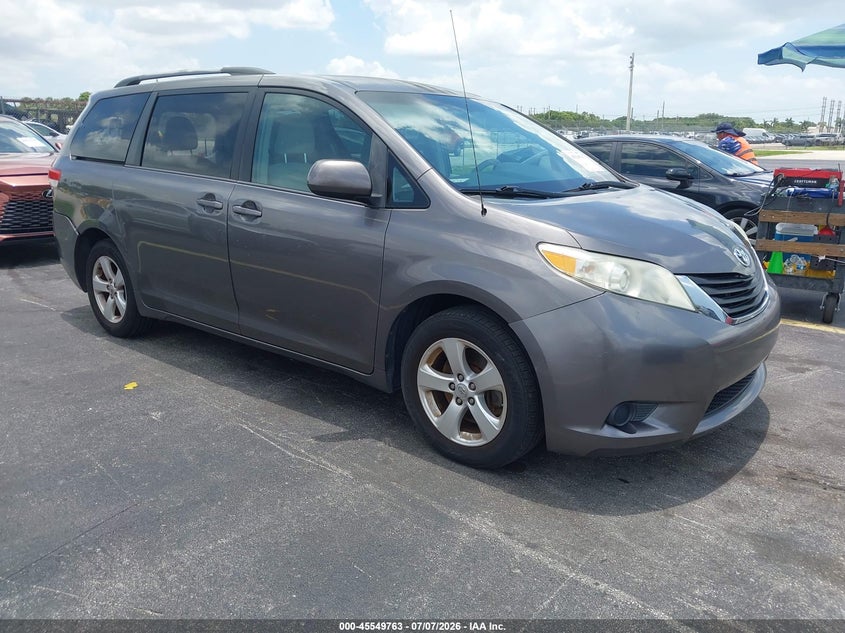2014 Toyota Sienna VIN 5TDKK3DC6ES431049 IAAI salvage auction — REAR END, Rebuildable (Florida), sold $2,900 on 2026-07-30 (photo 1)