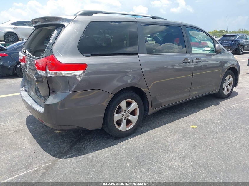 2014 Toyota Sienna VIN 5TDKK3DC6ES431049 IAAI salvage auction — REAR END, Rebuildable (Florida), sold $2,900 on 2026-07-30 (photo 4)