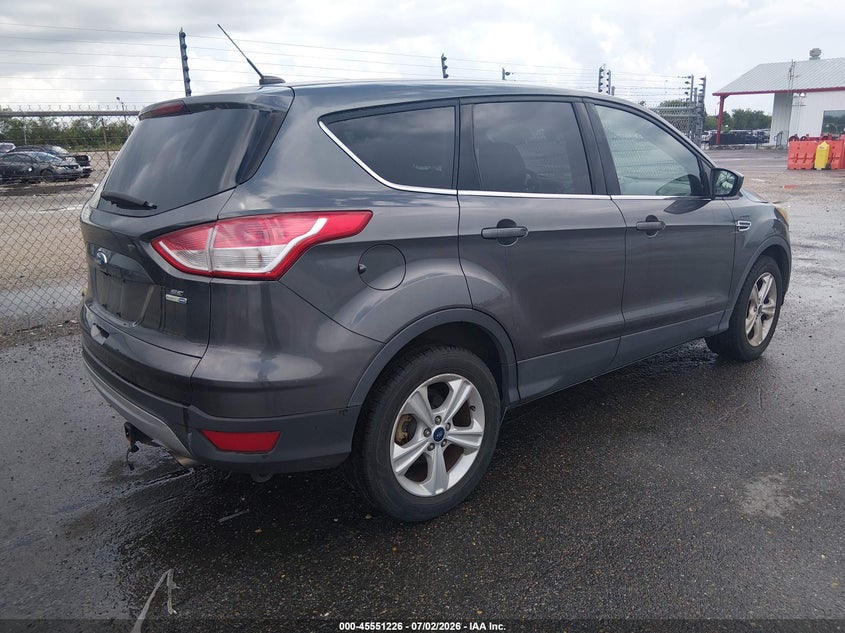 2016 Ford Escape VIN 1FMCU0GX3GUC01085 IAAI salvage auction — NORMAL WEAR, Salvage Title, sold $1,100 on 2026-08-03 (photo 4)
