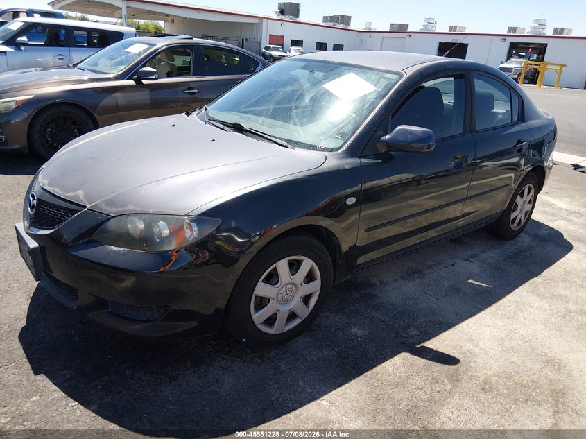 2006 Mazda 3 VIN JM1BK12F761453349 IAAI salvage auction — NORMAL WEAR, Clear (Nevada), sold $225 on 2026-07-17 (photo 2)