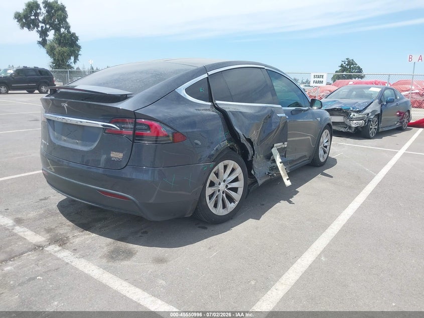 2016 Tesla Model x VIN 5YJXCBE27GF015392 IAAI salvage auction — SIDE, Salvage Title, sold $3,950 on 2026-07-23 (photo 4)