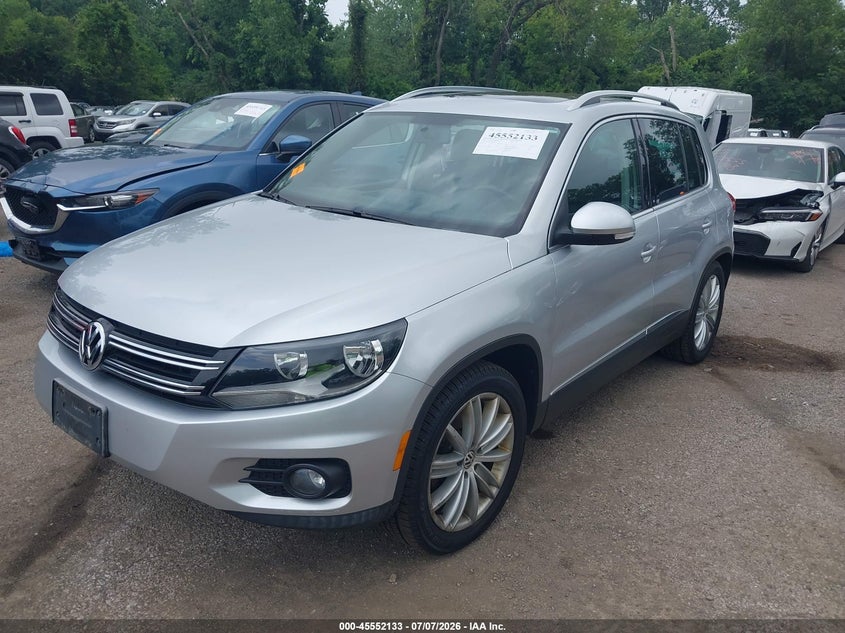 2012 Volkswagen Tiguan VIN WVGBV7AX3CW567492 IAAI salvage auction — RIGHT SIDE, Salvage Title, sold $1,125 on 2026-08-11 (photo 2)