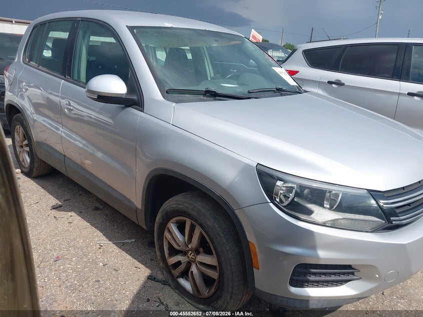 2014 Volkswagen Tiguan VIN WVGAV3AX0EW602027 IAAI salvage auction — NORMAL WEAR, Nrc Lienholder Repossession Paperwork (Texas), sold $25 on 2026-07-29 (photo 1)