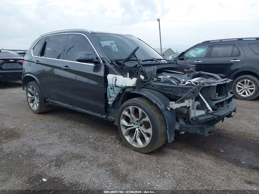 2014 BMW X5 VIN 5UXKR0C57E0H20412 IAAI salvage auction — THEFT, Wait Title, sold $700 on 2026-09-17 (photo 1)
