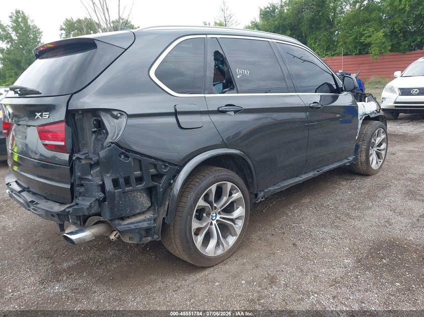 2014 BMW X5 VIN 5UXKR0C57E0H20412 IAAI salvage auction — THEFT, Wait Title, sold $700 on 2026-09-17 (photo 4)