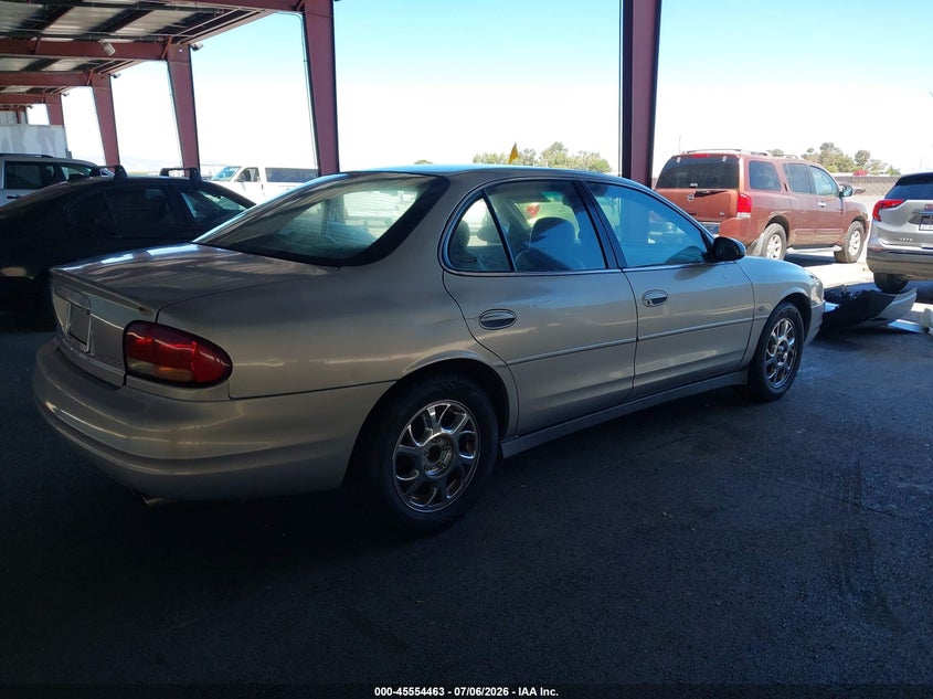 2000 Oldsmobile Intrigue VIN 1G3WX52H5YF331980 IAAI salvage auction — LEFT & RIGHT, Salvage (California), sold $250 on 2026-07-19 (photo 4)