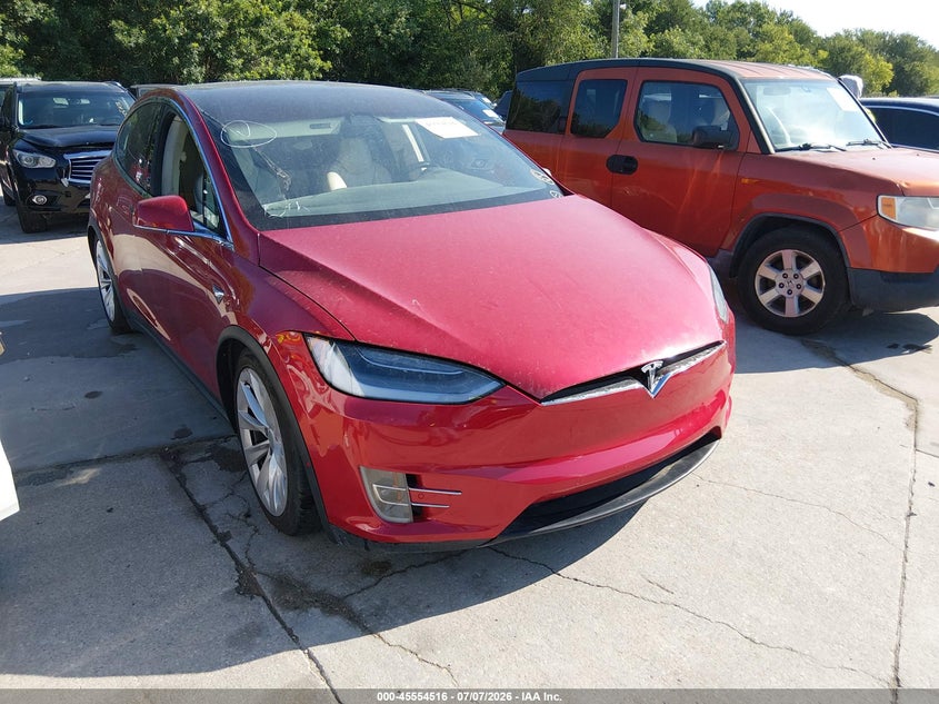2018 Tesla Model x VIN 5YJXCAE21JF142026 IAAI salvage auction — ALL OVER, Rebuilt (Indiana), sold $2,700 on 2026-07-27 (photo 1)