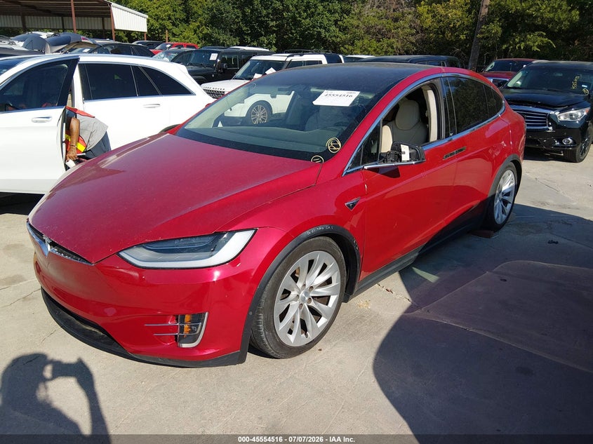 2018 Tesla Model x VIN 5YJXCAE21JF142026 IAAI salvage auction — ALL OVER, Rebuilt (Indiana), sold $2,700 on 2026-07-27 (photo 2)
