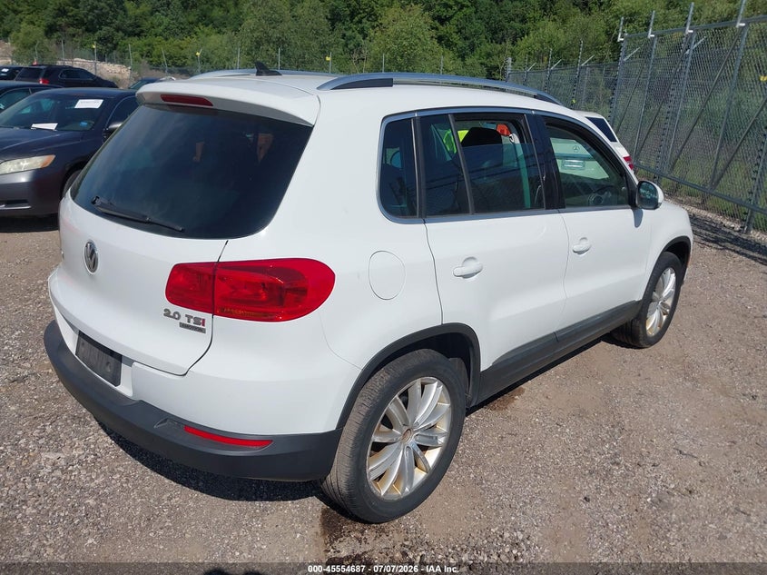 2015 Volkswagen Tiguan VIN WVGBV7AX0FW519260 IAAI salvage auction — NORMAL WEAR, Clear (Illinois), sold $1,750 on 2026-07-15 (photo 4)