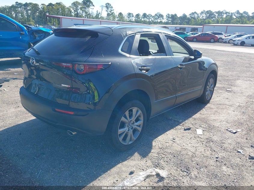 2025 Mazda Cx-30 VIN 3MVDMBCMXSM856064 IAAI salvage auction — LEFT SIDE, Rebuildable (Florida), sold $5,950 on 2026-08-29 (photo 4)