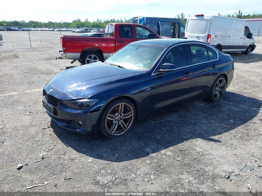 2012 BMW 3er VIN WBA3A5C56CF349497 IAAI salvage auction — NORMAL WEAR, Clear (Florida), sold $375 on 2026-07-29 (photo 2)