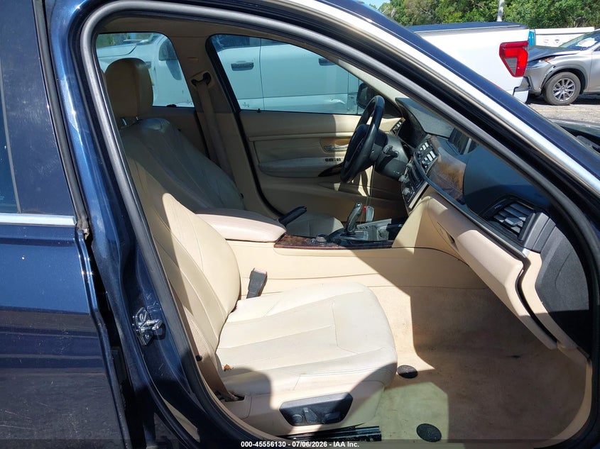 2012 BMW 3er VIN WBA3A5C56CF349497 IAAI salvage auction — NORMAL WEAR, Clear (Florida), sold $375 on 2026-07-29 (photo 5)