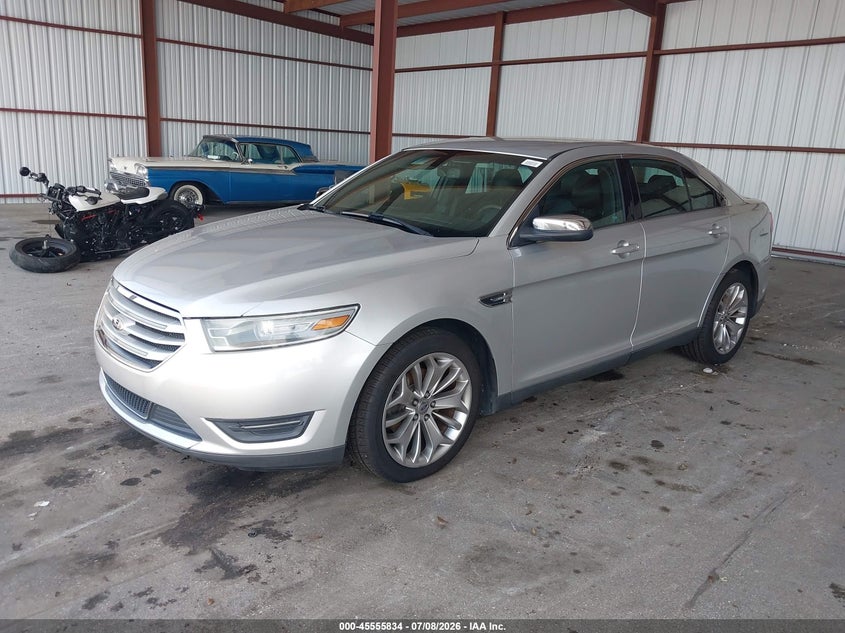 2014 Ford Taurus VIN 1FAHP2F87EG106103 IAAI salvage auction — UNKNOWN, Salvage Title, sold $300 on 2026-07-11 (photo 2)