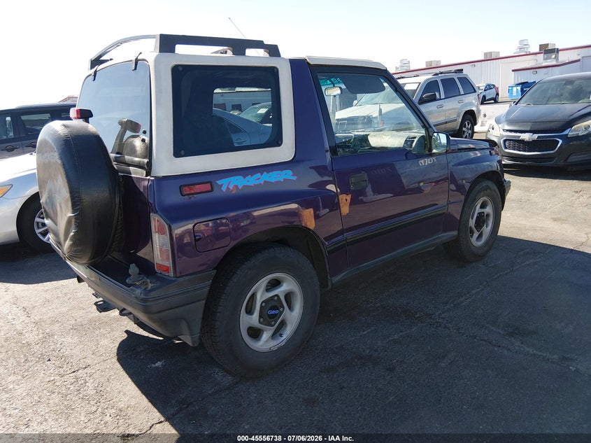 1995 Geo Tracker VIN 2CNBJ1865S6934410 IAAI salvage auction — NORMAL WEAR, Clear (Nevada), sold $850 on 2026-07-17 (photo 4)