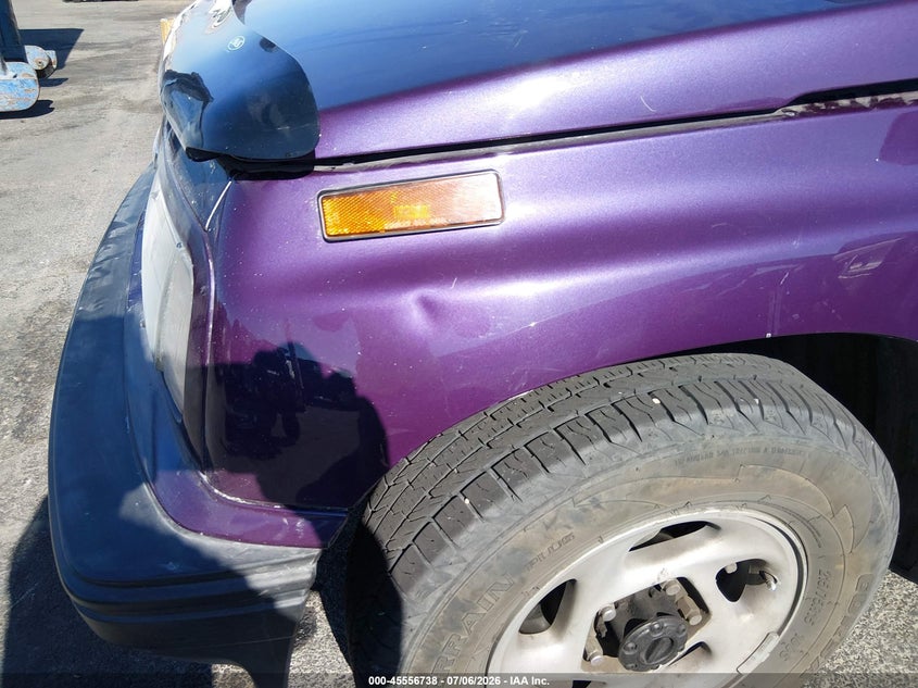 1995 Geo Tracker VIN 2CNBJ1865S6934410 IAAI salvage auction — NORMAL WEAR, Clear (Nevada), sold $850 on 2026-07-17 (photo 6)