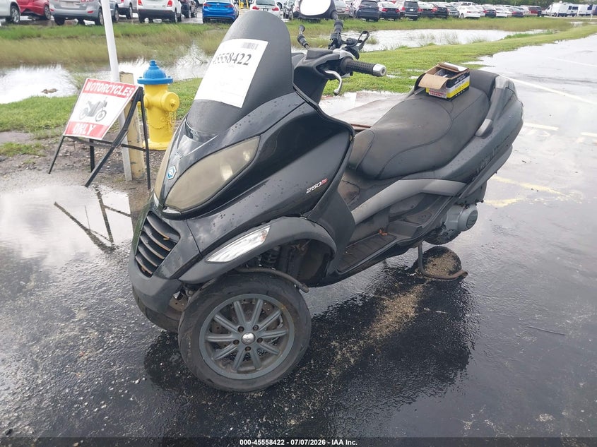 2009 Piaggio Mp3 VIN ZAPM479MX95003622 IAAI salvage auction — NORMAL WEAR, Clear (Florida), sold $25 on 2026-07-23 (photo 2)