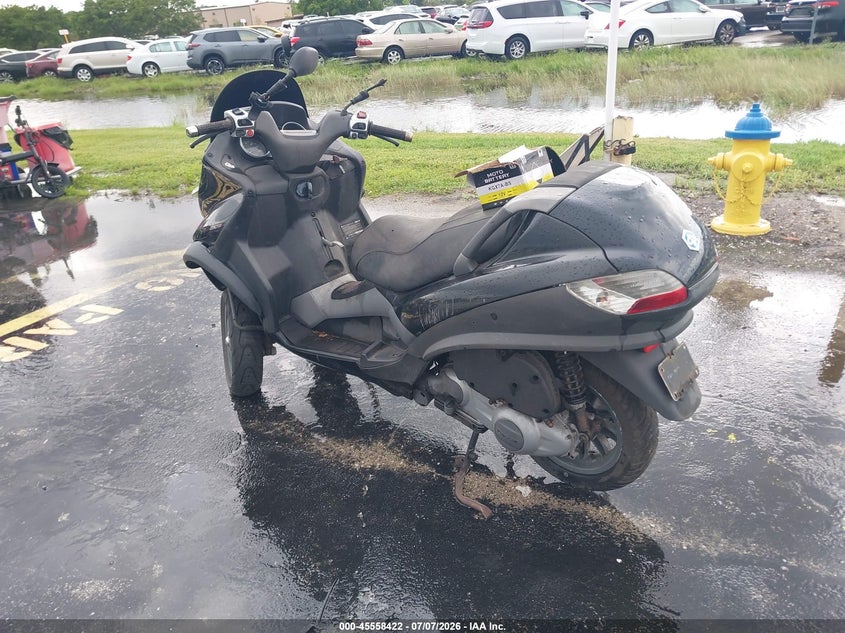 2009 Piaggio Mp3 VIN ZAPM479MX95003622 IAAI salvage auction — NORMAL WEAR, Clear (Florida), sold $25 on 2026-07-23 (photo 3)