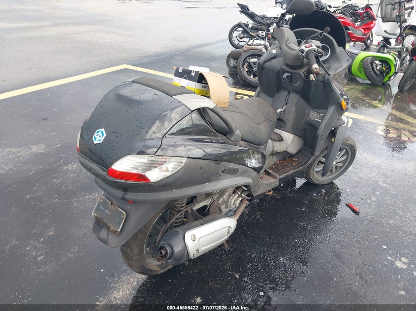 2009 Piaggio Mp3 VIN ZAPM479MX95003622 IAAI salvage auction — NORMAL WEAR, Clear (Florida), sold $25 on 2026-07-23 (photo 4)