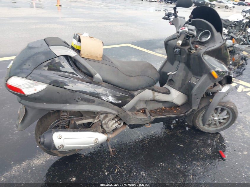 2009 Piaggio Mp3 VIN ZAPM479MX95003622 IAAI salvage auction — NORMAL WEAR, Clear (Florida), sold $25 on 2026-07-23 (photo 6)