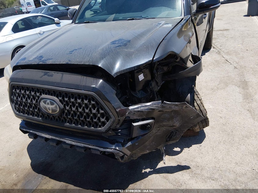 2019 Toyota Tacoma VIN 3TMCZ5AN6KM225047 IAAI salvage auction — FRONT END, Salvage Title, sold $9,750 on 2026-08-24 (photo 6)