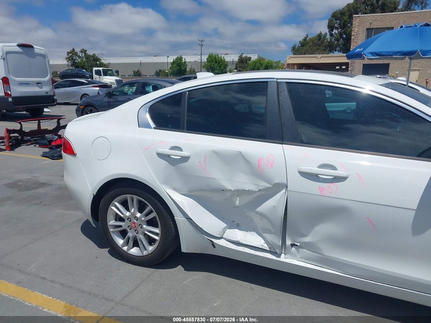2017 Jaguar Xe VIN SAJAD4BG1HA965953 IAAI salvage auction — SIDE, Salvage Title, sold $525 on 2026-07-29 (photo 6)