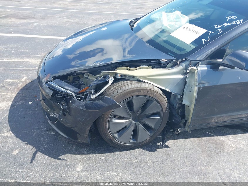 2026 Tesla Model 3 VIN 5YJ3E1EA5TF117536 IAAI salvage auction — LEFT FRONT, Certificate Of Destruction (Florida), sold $12,000 on 2026-08-02 (photo 6)