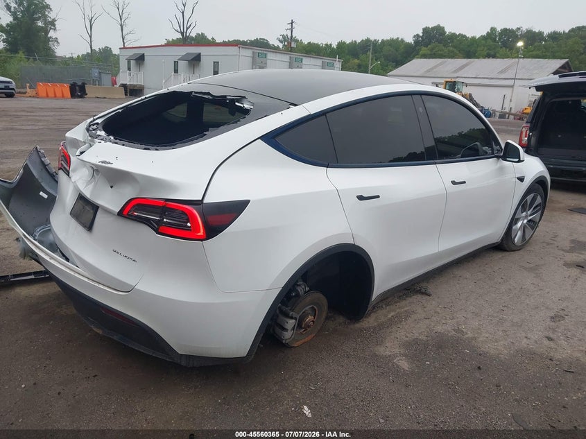 2023 Tesla Model y VIN 7SAYGDEEXPA063483 IAAI salvage auction — REAR END, Salvage - 75% Or Less (Maryland), sold $5,700 on 2026-07-29 (photo 4)