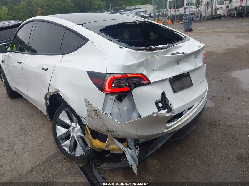 2023 Tesla Model y VIN 7SAYGDEEXPA063483 IAAI salvage auction — REAR END, Salvage - 75% Or Less (Maryland), sold $5,700 on 2026-07-29 (photo 6)