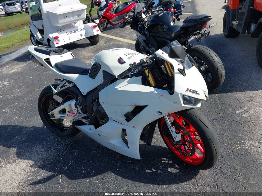 2014 Honda Cbr VIN JH2PC4084EK700013 IAAI salvage auction — SIDE, Rebuildable (Florida), sold $2,075 on 2026-07-29 (photo 1)