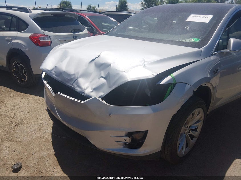 2016 Tesla Model x VIN 5YJXCBE27GF005722 IAAI salvage auction — ALL OVER, Salvage (Idaho), sold $4,550 on 2026-09-03 (photo 6)