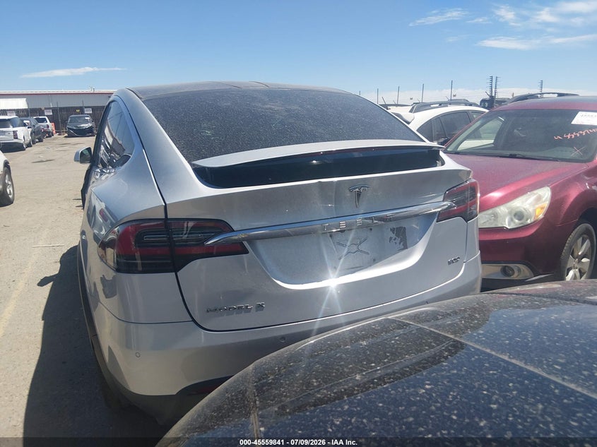 2016 Tesla Model x VIN 5YJXCBE27GF005722 IAAI salvage auction — ALL OVER, Salvage (Idaho), sold $4,550 on 2026-09-03 (photo 4)