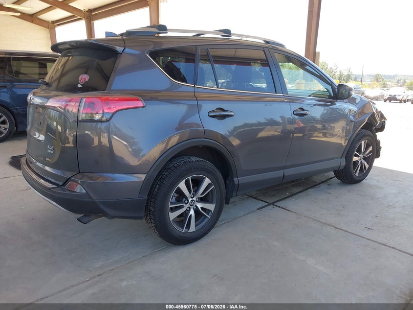 2017 Toyota Rav 4 VIN JTMRFREV7HJ114517 IAAI salvage auction — RIGHT FRONT, Salvage Title, sold $7,500 on 2026-07-22 (photo 4)