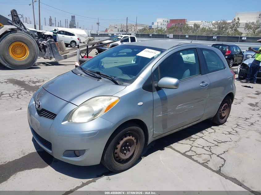 2009 Toyota Yaris VIN JTDJT903495222986 IAAI salvage auction — SIDE, Salvage (California), sold $1,075 on 2026-07-22 (photo 2)