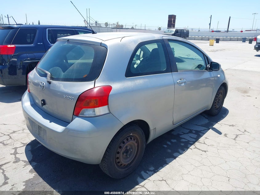 2009 Toyota Yaris VIN JTDJT903495222986 IAAI salvage auction — SIDE, Salvage (California), sold $1,075 on 2026-07-22 (photo 4)
